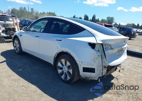 2023 Tesla Model Y Awd/Long Range Dual Motor All-Wheel Drive z USA, uszkodzony, nr VIN 7SAYGAEE1PF700262